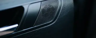 Close-up of a car door speaker