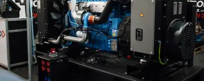 Engine with drive belts on display