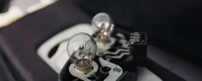 Bulbs laid out on a car dashboard