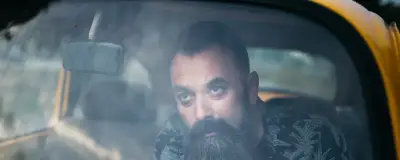 Driver in a car looking through the windscreen