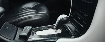 Gear selector and console in a car interior