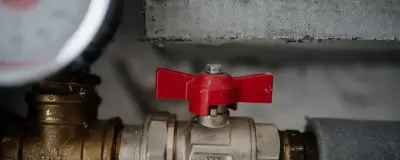 Valve and pressure gauge on a pipe system