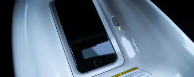 A wireless phone charger in a car