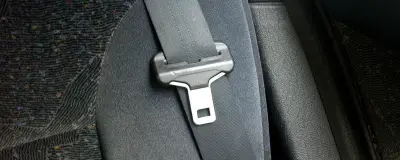 A seat belt and buckle