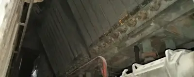 Розширювальний бачок у моторному відсіку