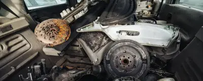 Car parts stacked inside a vehicle