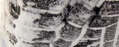 A winter tyre in snow