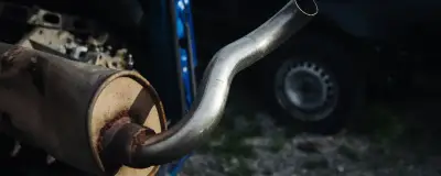 Car exhaust pipe at a scrapyard